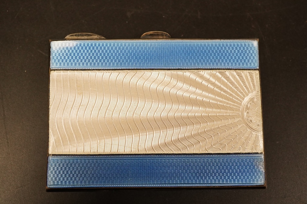 A George V Art Deco engine turned silver and guilloche enamel cigarette case length 8.2cm., weight approx. 3.24ozt